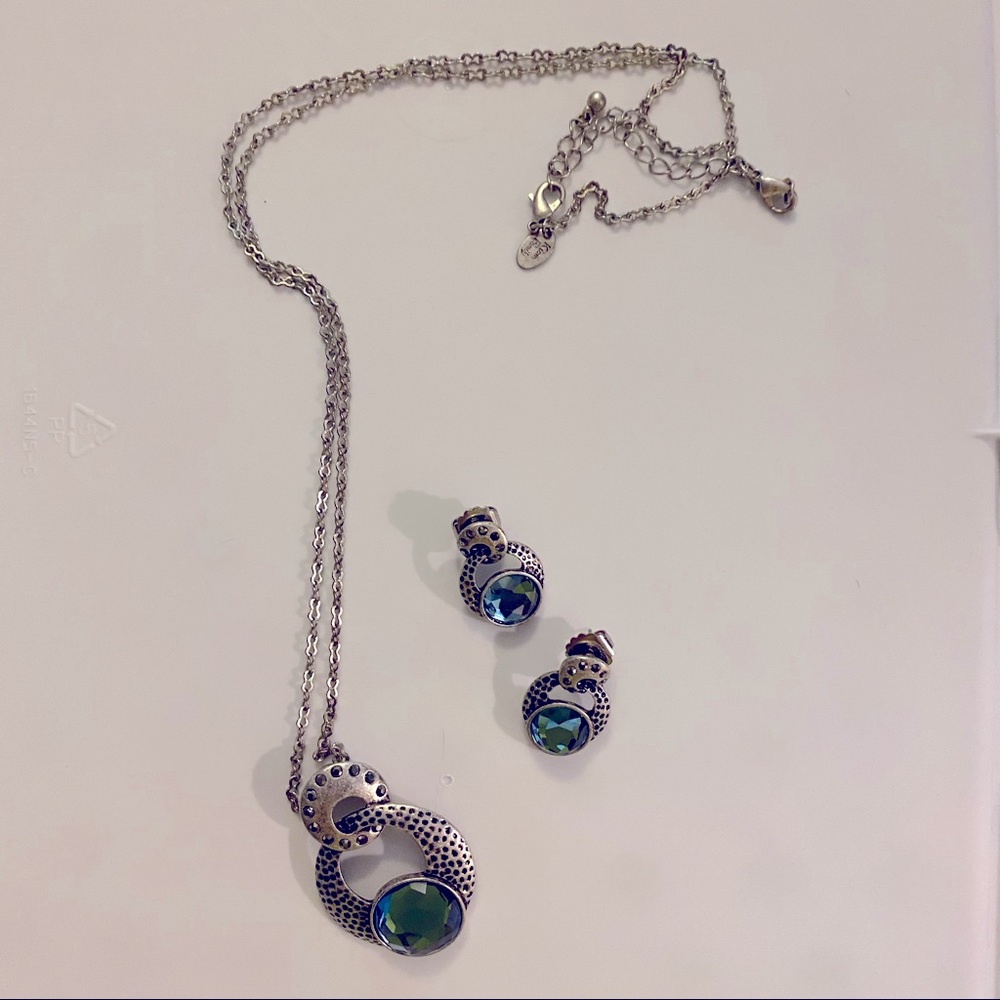 Silver and blue Lia Sophia Kiam family necklace and earring set.